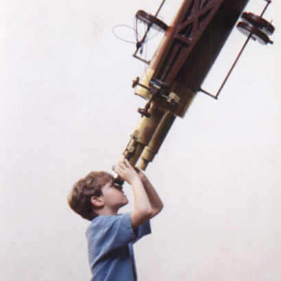 Linus looking through the Mitchel Telescope